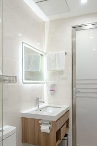 Koupelna v ubytování Kekehyu Business Hotel