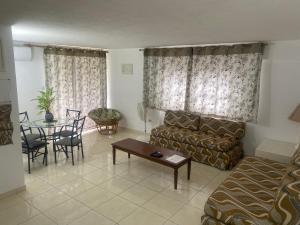 Setusvæði á Sunset condos getaway In Ocho Rios