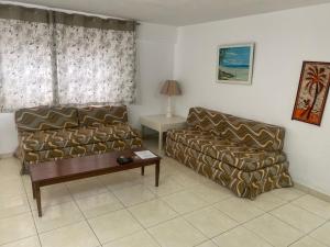 Setusvæði á Sunset condos getaway In Ocho Rios
