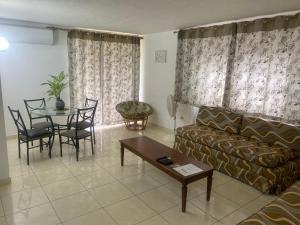 Setusvæði á Sunset condos getaway In Ocho Rios