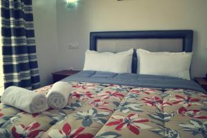 Postel nebo postele na pokoji v ubytování Hotel La Place