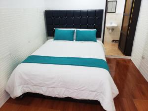 Postel nebo postele na pokoji v ubytování Cusco de mis Sueños Hostal - II