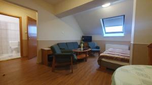 Posezení v ubytování Hotel Baross
