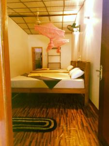 Postel nebo postele na pokoji v ubytování Margosa Guesthouse
