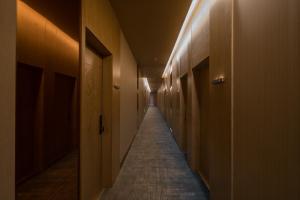 Foto dalla galleria di Dequan Luxury Hotel Bird's Nest BranchCoffee, fruits, snacks, a gym and a laundry room are provided for free in the lobby a Pechino