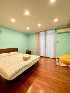 Postel nebo postele na pokoji v ubytování Wangs Hostel