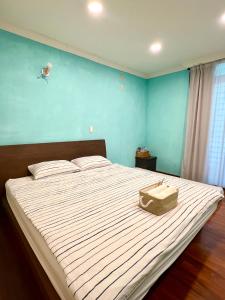 Postel nebo postele na pokoji v ubytování Wangs Hostel