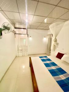 Postel nebo postele na pokoji v ubytování Sheran Safari House