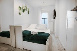Posteľ alebo postele v izbe v ubytovaní Apartment Generacija