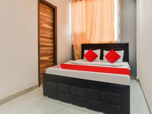 Postel nebo postele na pokoji v ubytování Hotel O Iris Lite