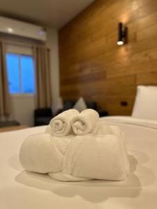 Ένα ή περισσότερα κρεβάτια σε δωμάτιο στο EbS Residence Chaweng