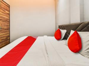 Postel nebo postele na pokoji v ubytování Hotel O Iris Lite