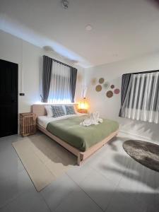 Postel nebo postele na pokoji v ubytování 7Senses Resort