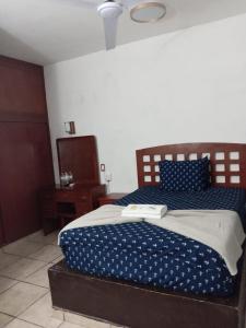 Postel nebo postele na pokoji v ubytování Hotel Colonos Los Cabos