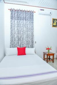 Letto o letti in una camera di Turtle cove residence
