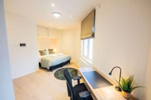 Ένα ή περισσότερα κρεβάτια σε δωμάτιο στο Royal 60m2 One Bedroom Apartment - VW140A