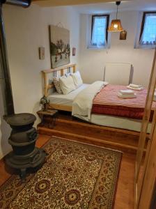 Posteľ alebo postele v izbe v ubytovaní Μaisonette Elpida + 3 fotografie