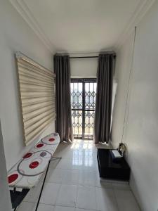 Postel nebo postele na pokoji v ubytování Crasto Suites