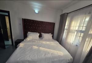 Postel nebo postele na pokoji v ubytování Crasto Suites