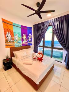 Ένα ή περισσότερα κρεβάτια σε δωμάτιο στο LEGOLAND ELYSIA PARK 2 BEDROOM with Luxe Pool Cozy Stay