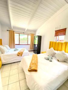 Una cama o camas en una habitación de Isina Mova