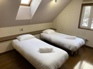 Postel nebo postele na pokoji v ubytování Midway Makkari House