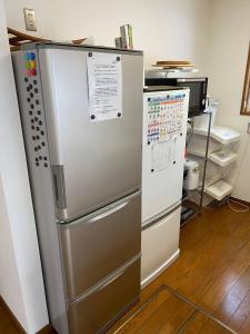 Kuchyň nebo kuchyňský kout v ubytování Midway Makkari House