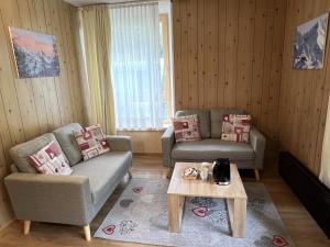 Khu vực ghế ngồi tại Amba Chalet Famiglia Cima - Trilocale 6 posti letto