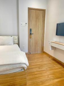 The CK Hotel客房内的一张或多张床位