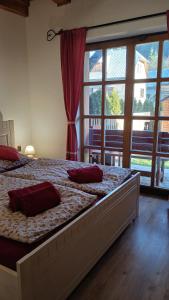 Postel nebo postele na pokoji v ubytování Apartmán Jezerné