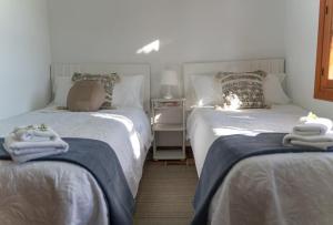 Postel nebo postele na pokoji v ubytování La Casita (Villa cerca de Peñíscola y Morella)