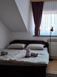 Postel nebo postele na pokoji v ubytování Apartman Anita