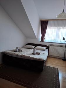 Postel nebo postele na pokoji v ubytování Apartman Anita