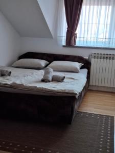 Postel nebo postele na pokoji v ubytování Apartman Anita