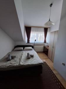 Postel nebo postele na pokoji v ubytování Apartman Anita