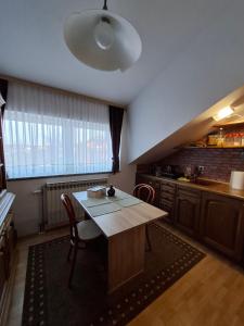 Kuchyň nebo kuchyňský kout v ubytování Apartman Anita