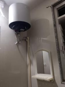 Koupelna v ubytování Malhar Home Stay