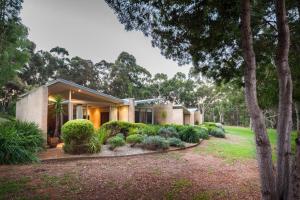a house with a garden in front of it at Gilgara Retreat in Margaret River Town