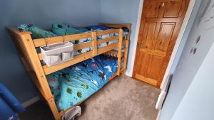 Postel nebo postele na pokoji v ubytování Curracloe Beach House