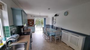 Kuchyň nebo kuchyňský kout v ubytování Curracloe Beach House