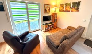 Μια τηλεόραση ή/και κέντρο ψυχαγωγίας στο RainValley Apartment
