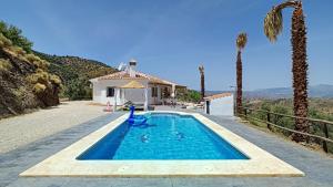 Πισίνα στο ή κοντά στο Casa Qué Tel