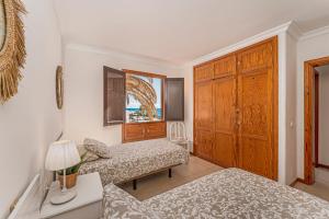 En eller flere senge i et værelse på Lanzarote Bliss + 22 billeder