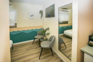 Posezení v ubytování Domus Bat Galim Hotel