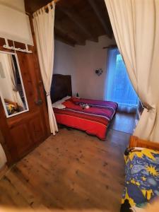 Ένα ή περισσότερα κρεβάτια σε δωμάτιο στο Maison de vacances +12 φωτογραφίες