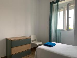 Postel nebo postele na pokoji v ubytování El Rincon de los Girasoles