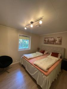 Ένα ή περισσότερα κρεβάτια σε δωμάτιο στο Villa 10 min walk from Ski World Championship