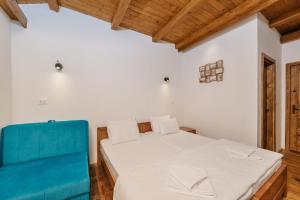 Katil atau katil-katil dalam bilik di Hotel Porto Tara