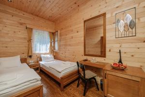 Katil atau katil-katil dalam bilik di Hotel Porto Tara