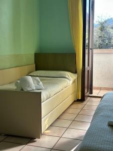 Postel nebo postele na pokoji v ubytování Hotel C0C00N Garden